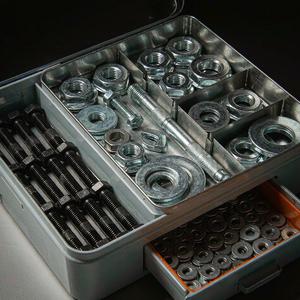 Black-oxide and galvanized fasteners in premium compartments
