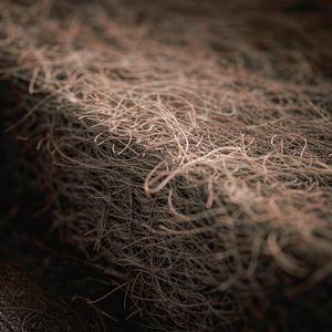 Nonwoven geotextile fiber texture in raking light