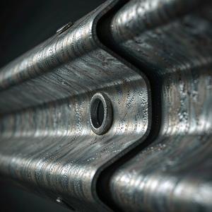 Close-up of W-beam corrugation with bolt holes