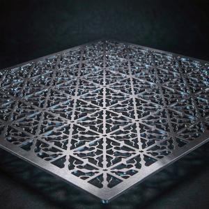 Laser-cut stainless mesh with decorative pattern