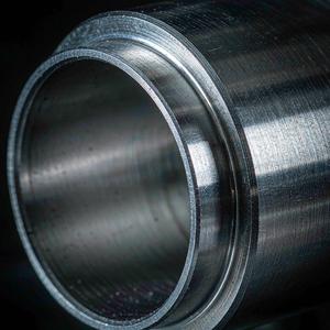 Close-up of a beveled pipe end showing wall thickness