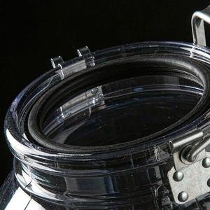 Close-up of a pail rim with sealing lid and handle