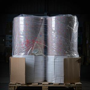 Label rolls on cores packed in export cartons