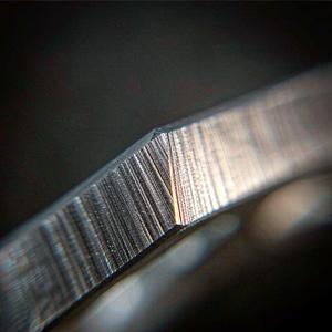 Close-up of a burr-free stamped bracket edge