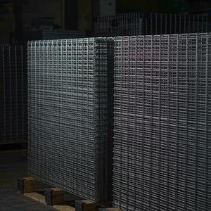 Wire mesh panels strapped on export pallets